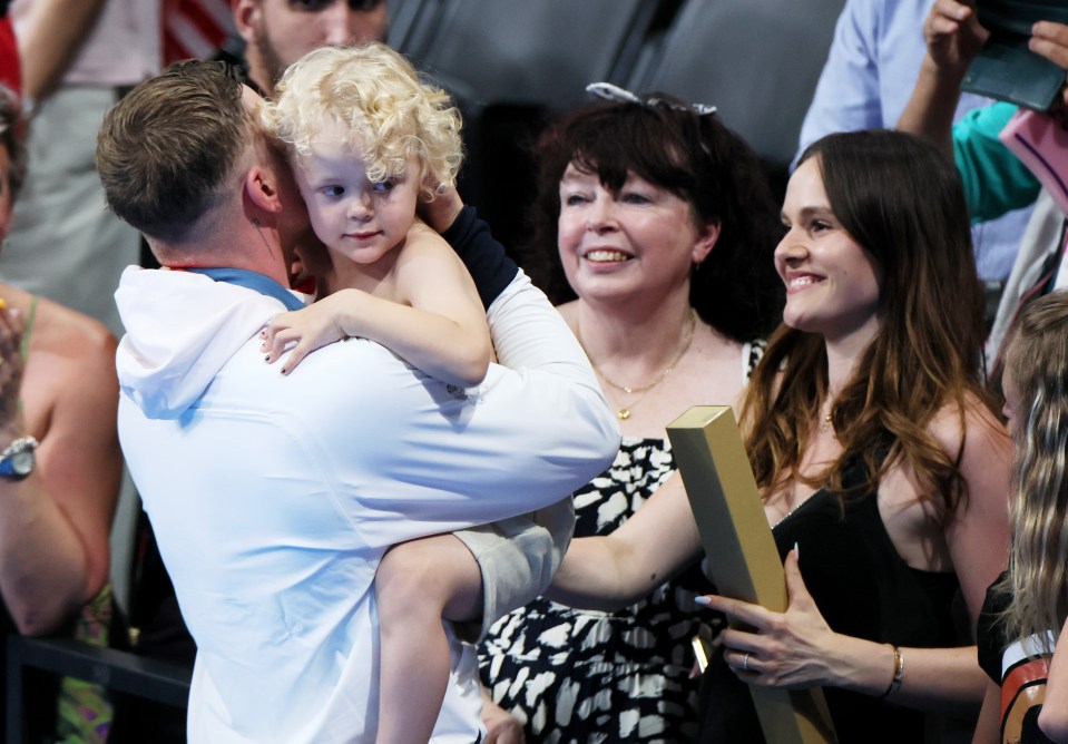 The Team GB hero was quick to celebrate with his son George and partner Holly Ramsay