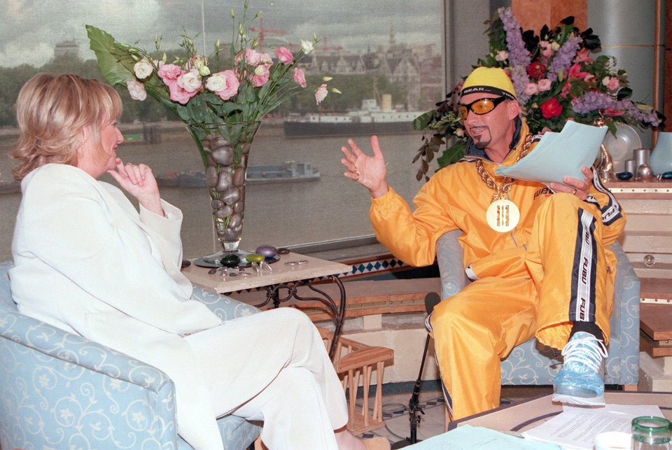 Richard being interviewed by Judy after transforming into Ali G