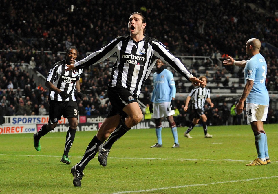 Carroll celebrating after scoring for Newcastle United against Manchester City in 2010