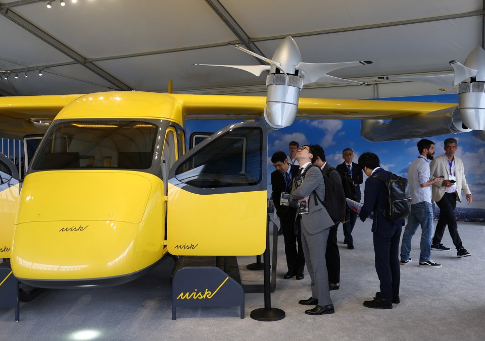 a yellow vehicle with the word wish on the side