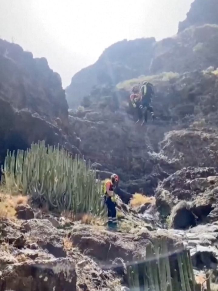 The body was found in a 'very inaccessible area' after rescue workers were forced to battle against the rough terrain