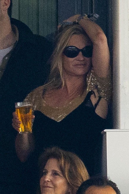 Kate was seen by one of my BST backstage moles ­holding what looked like a frothy lager and dancing wildly