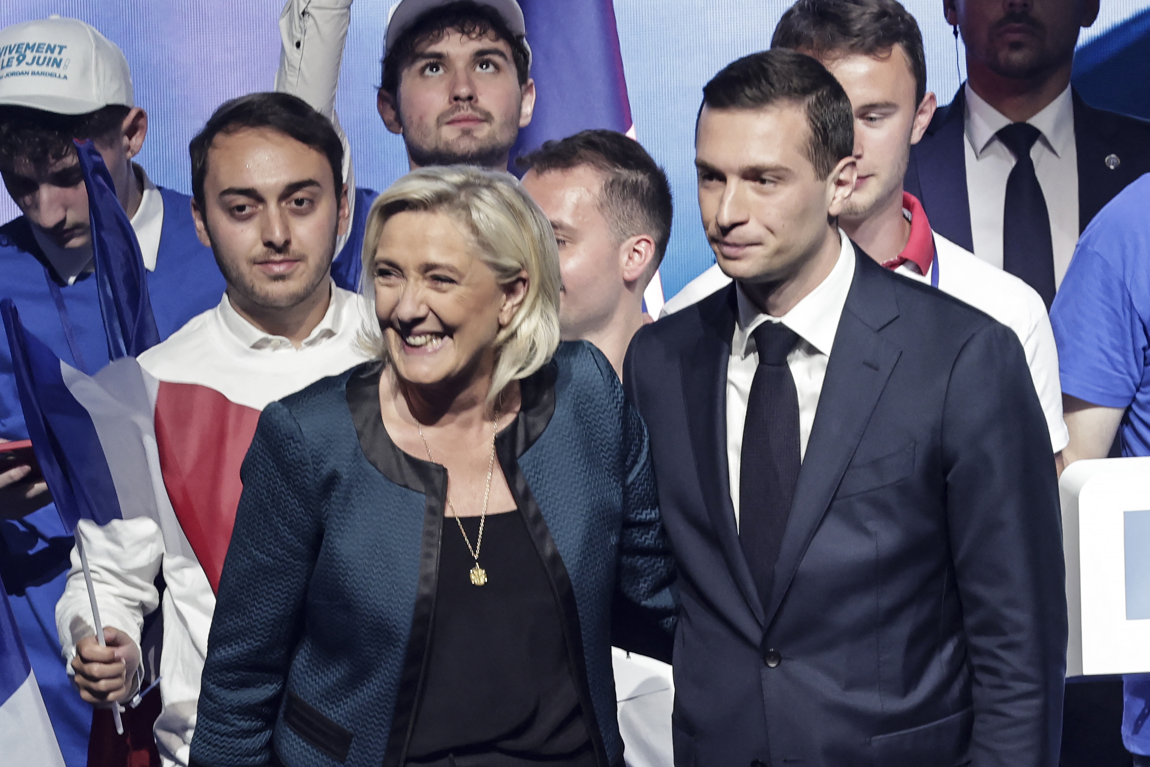 Marine Le Pen with her RN party leader, after their initial win on June 30