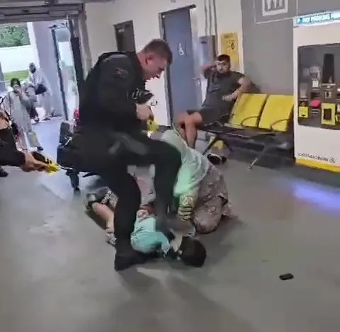 The officer appears to stamp on the man’s head after kicking him in the face