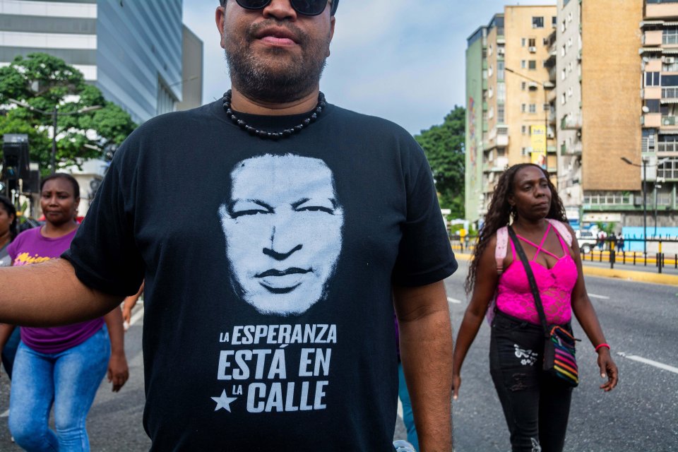 One Maduro supporter wears a Hugo Chavez t-shirt