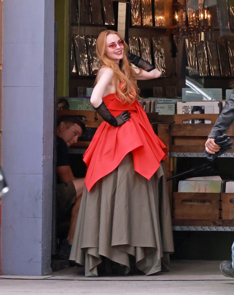 Lindsay wore a red ballgown as she worked on the Freaky Friday sequel