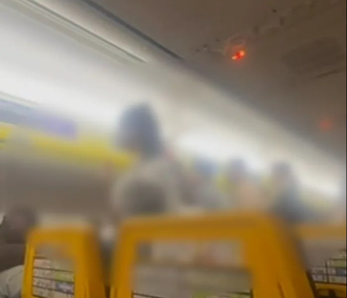 The Ryanair flight experienced absolute chaos as passengers were stood up screaming at each other