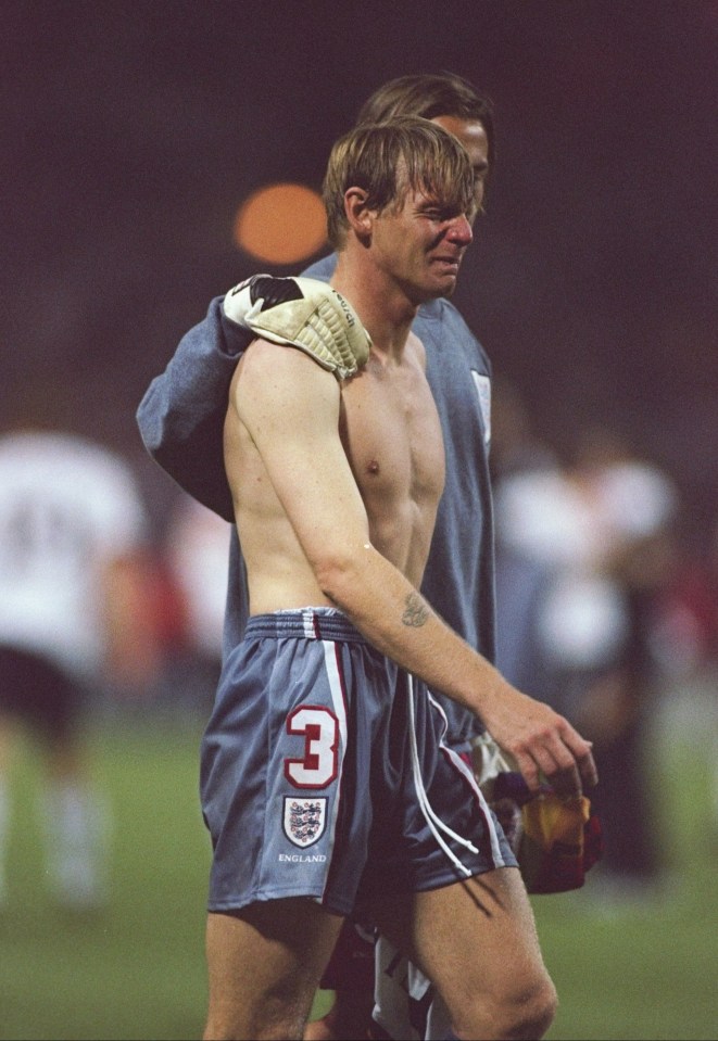 England’s Stuart Pearce is consoled after England loose on penalties to Germany at the 1996 Euros