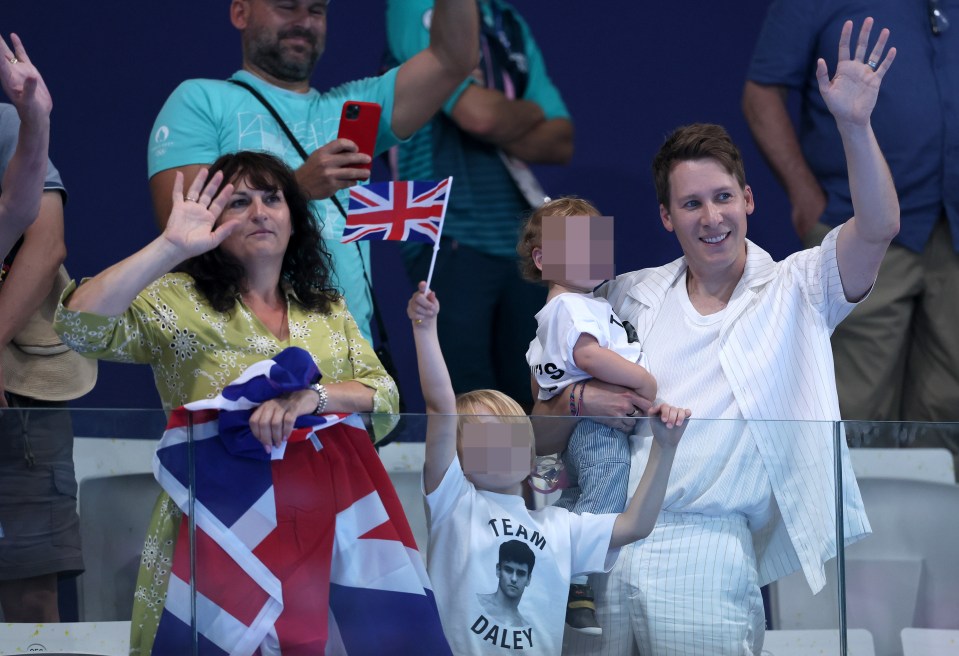 Daley’s mum Debbie, husband Dustin Lance Black and two sons