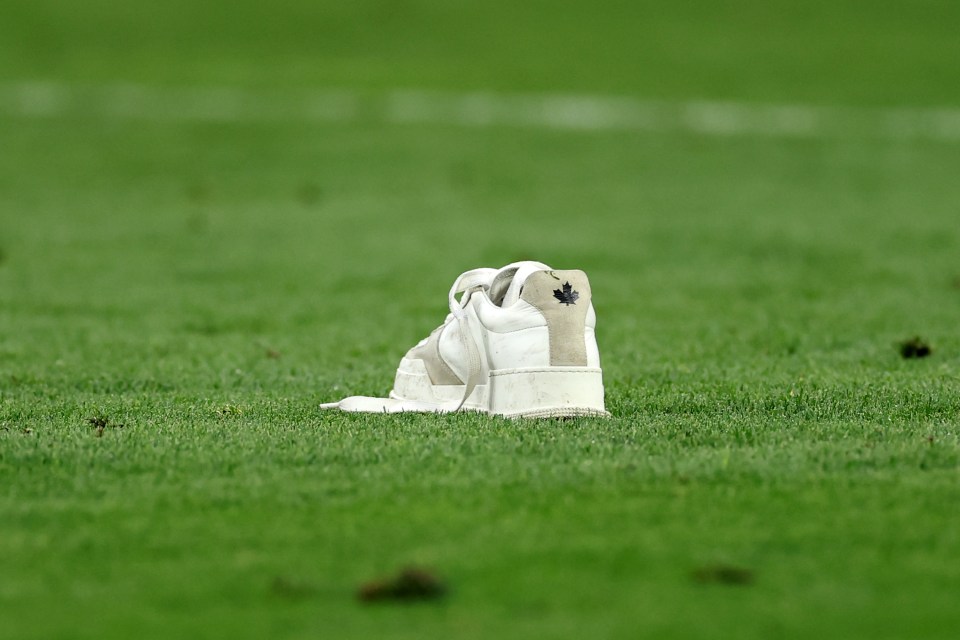 A pitch invader had stormed the pitch moments earlier, leaving their shoes behind