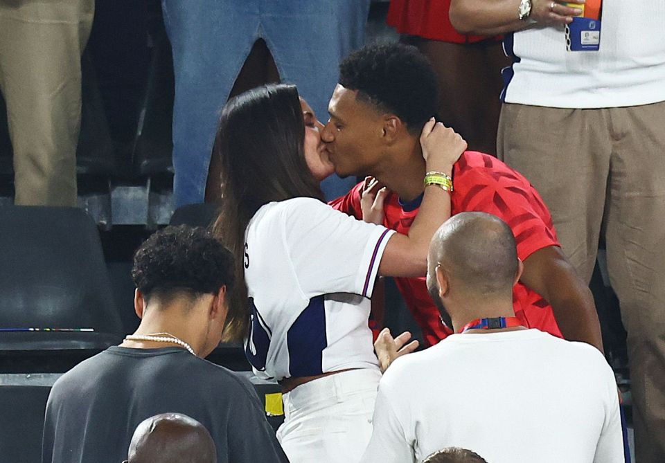 Ollie Watkins kisses partner Ellie Alderson