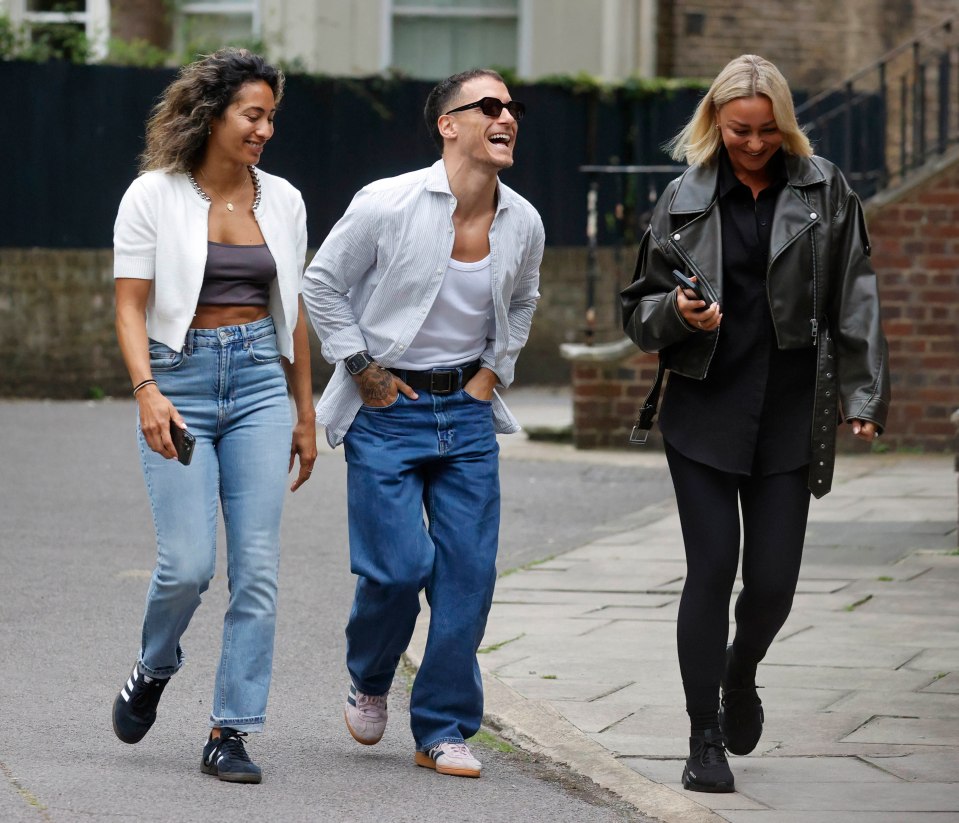 Gorka Maquez giggled as he was flanked by Karen Hauer and Luba Mushtuk