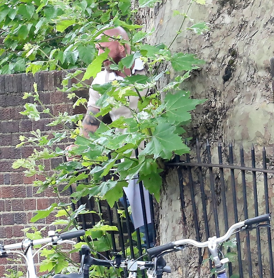 A security guard could be seen making sure the area was safe