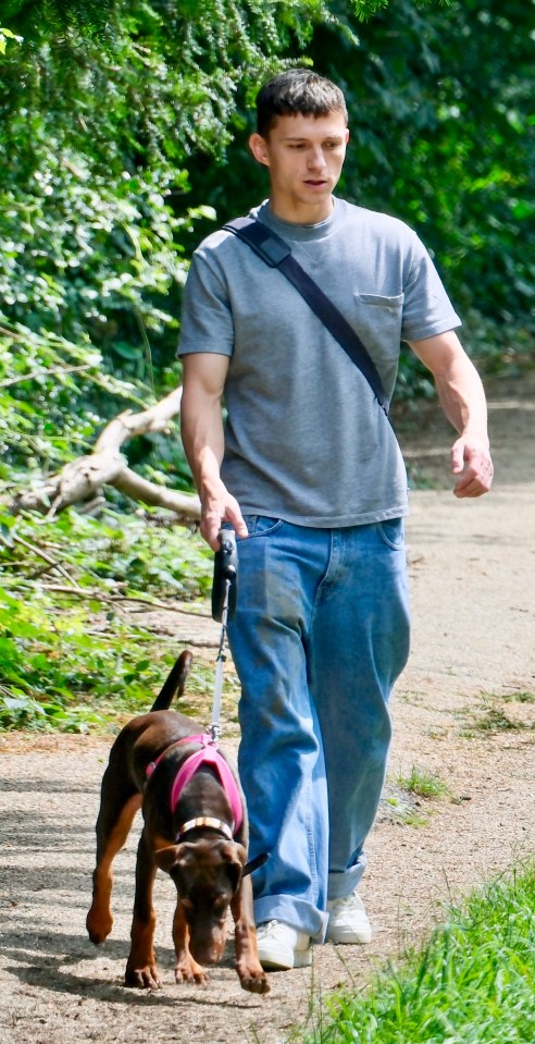 Holland with his Doberman puppy