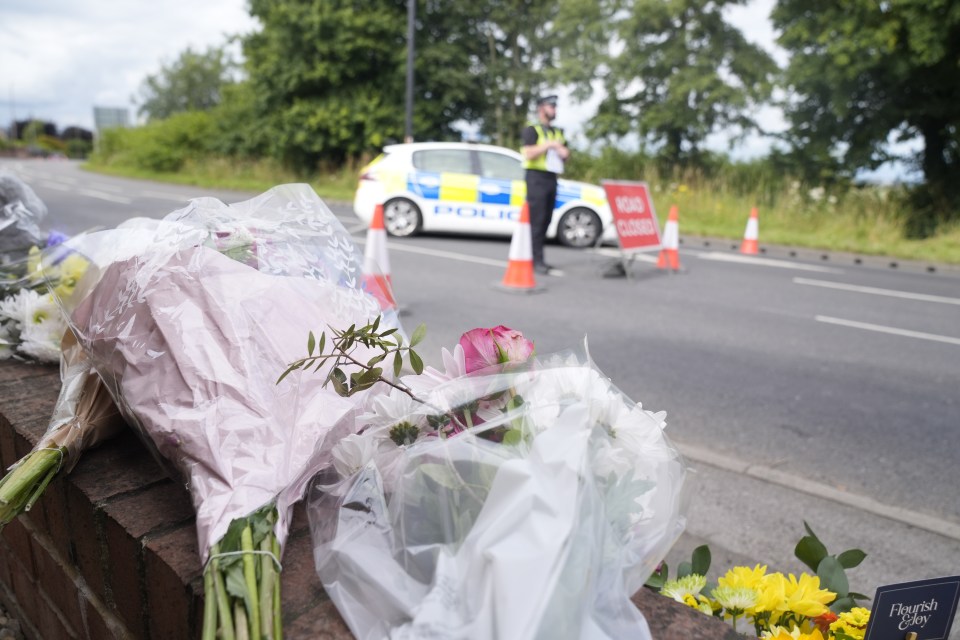 Flowers and tributes laid near scene on the A61 in Wakefield