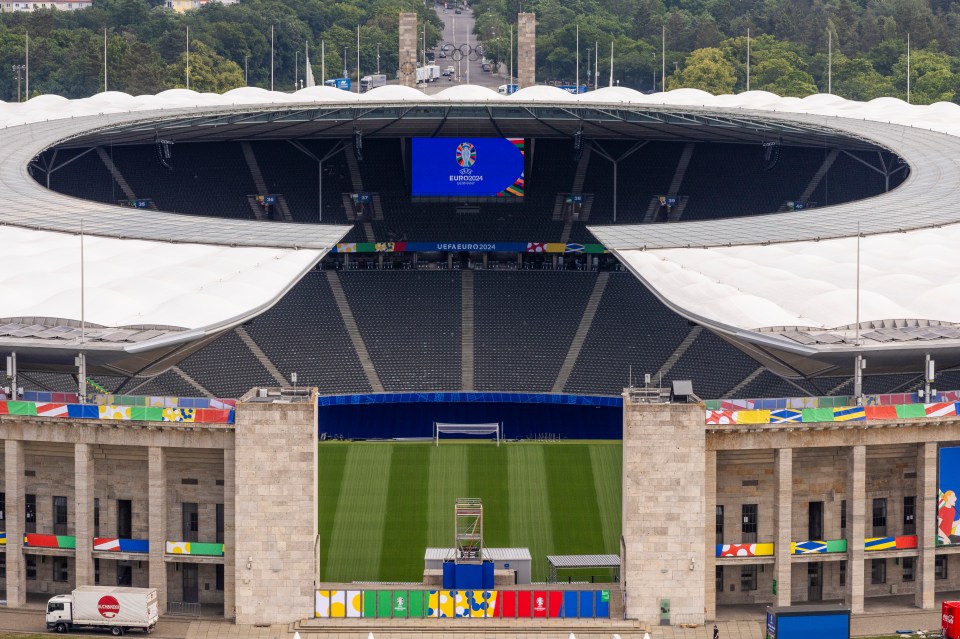 a soccer stadium with a large screen that says euro2020