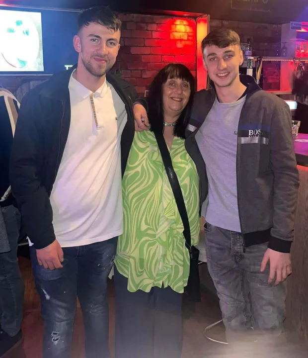 Jay (R) with his older brother Zak (L) and mum Debbie Duncan (C)