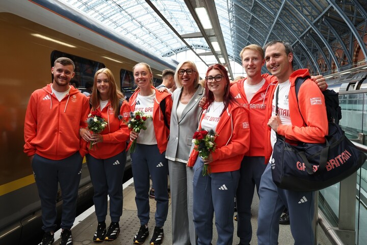 a group of people wearing jackets that say great britain