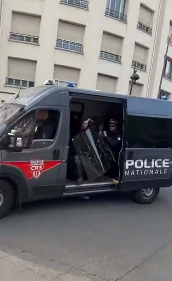 Cops with riot gear were spotted in vans behind the Israeli team