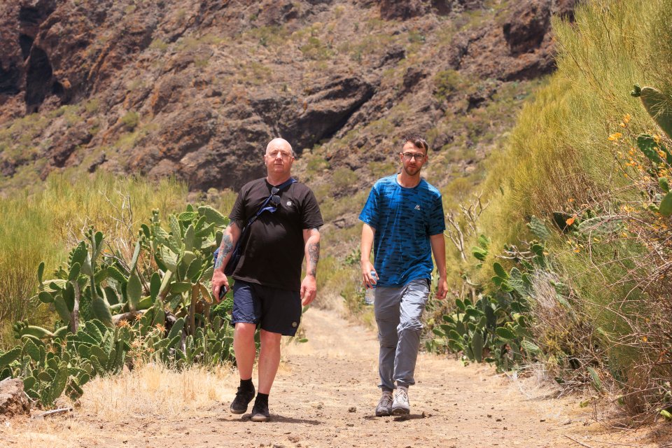 Jay's dad and brother, Warren and Zak, trekking through the mountains to look for Jay