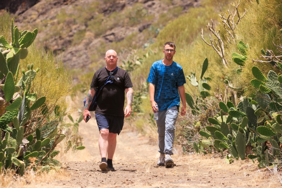 Jay Slater's dad Warren Slater and brother Zak on the mountain track where Jay's phone last pinged