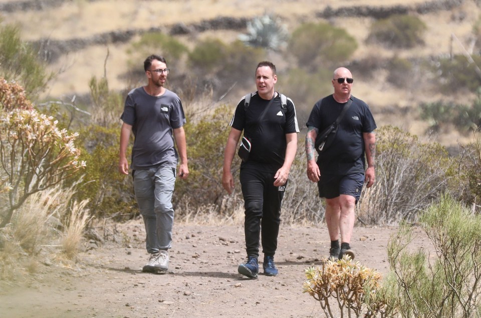 Jay Slater's brother Zak (L) and dad Warren (R) searching for Jay