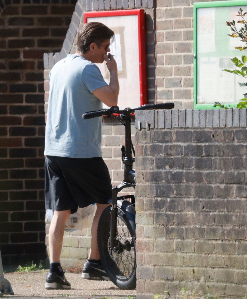 Alford pictured leaving his home on an electric bike