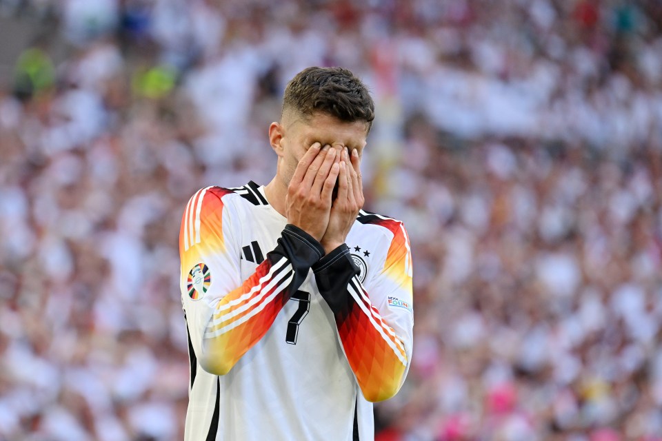 Kai Havertz look on in frustration