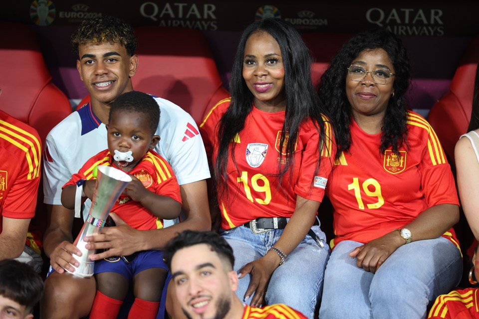 a group of people wearing red shirts with the number 19 on them