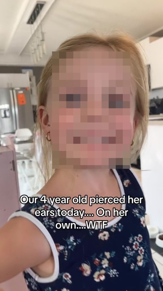 Her daughter was thrilled with her new accessory after piercing her ears by herself