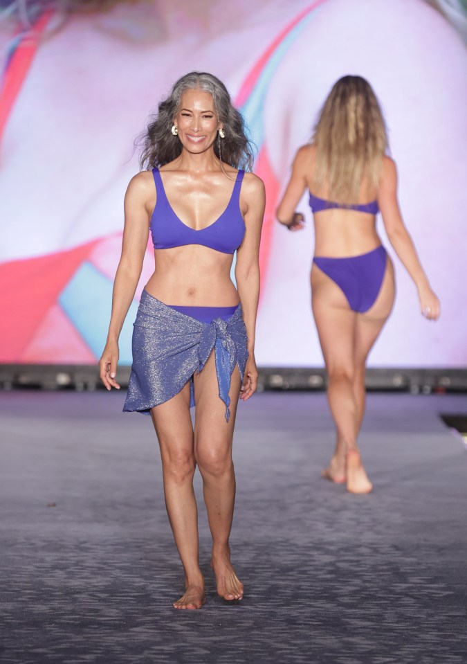 Nina Cash proves age is just a number as she struts the catwalk in a bikini