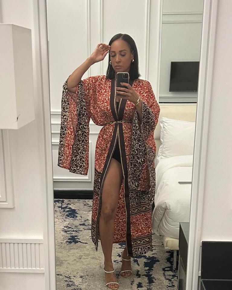 She slipped into a swimsuit and patterned kimono while on holiday