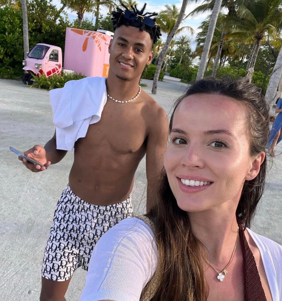 Ollie Watkins poses on holiday with Ellie Alderson