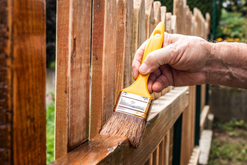 Power washers can run the paint job on your fence