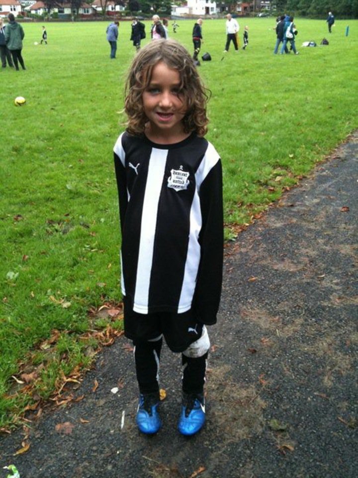 Jay is a big football fan, here dressed in his kit in 2011