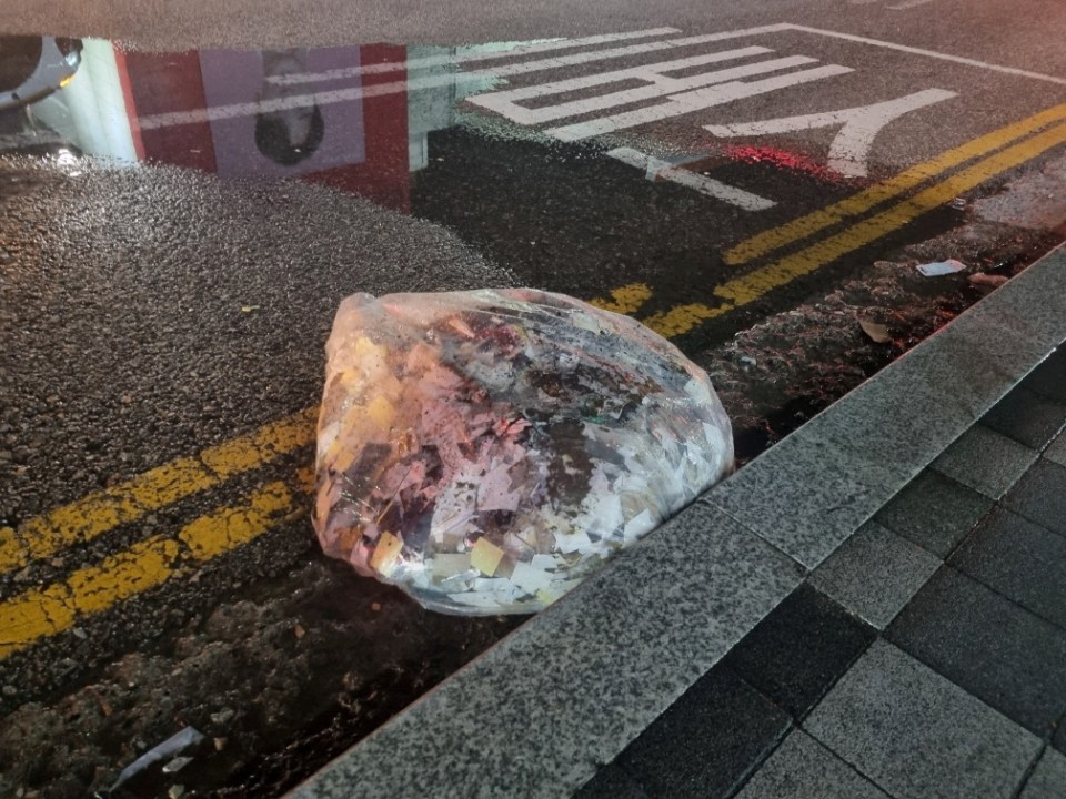 A plastic bag carrying various objects including what appeared to be trash that crossed inter-Korean border with a balloon