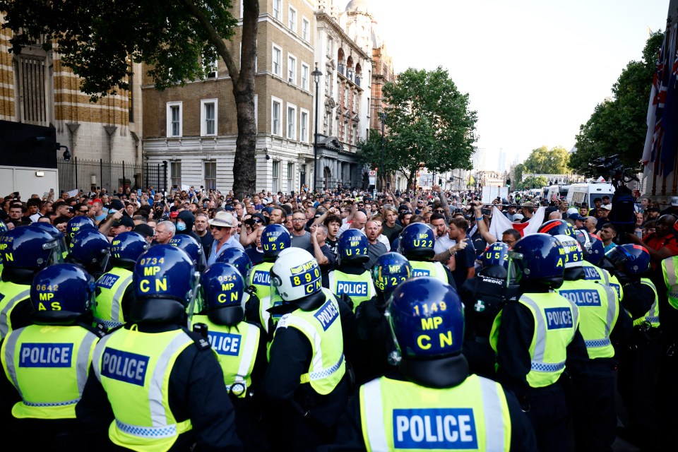 Hundreds of protesters are clashing with cops in London