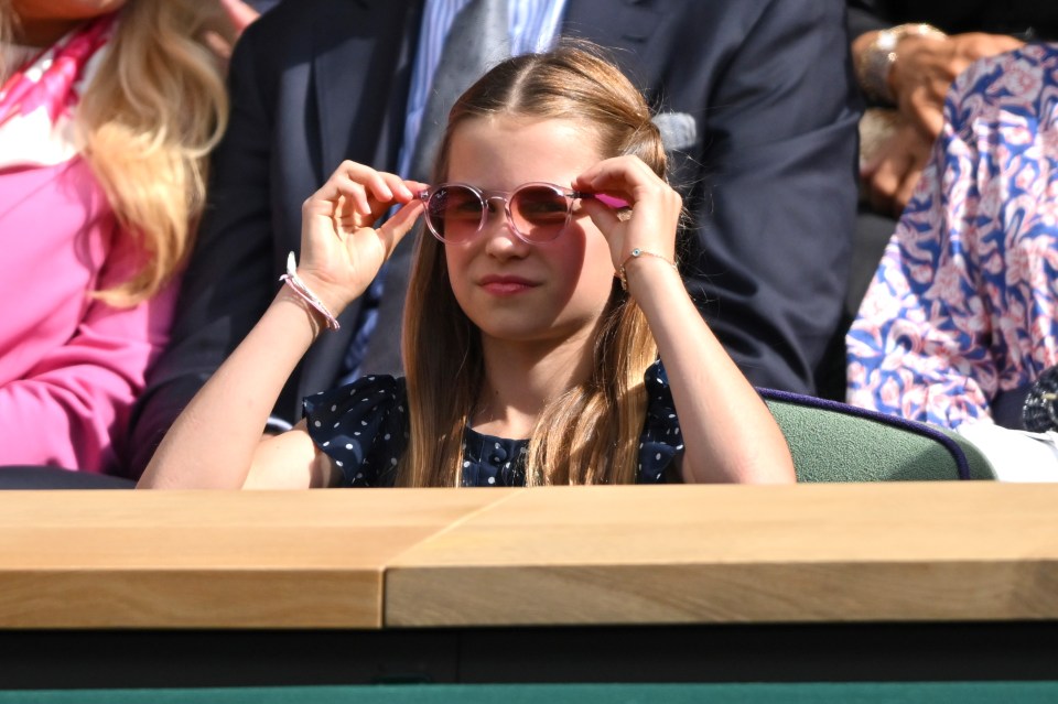 The Princess paired her outfit with adorable pink sunglasses