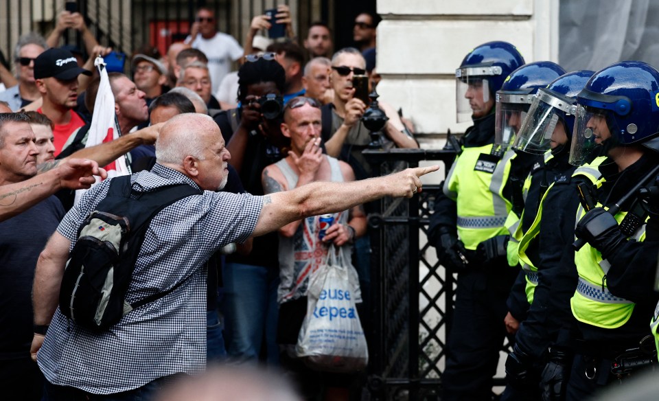 Cops stood firm as the clashes erupted