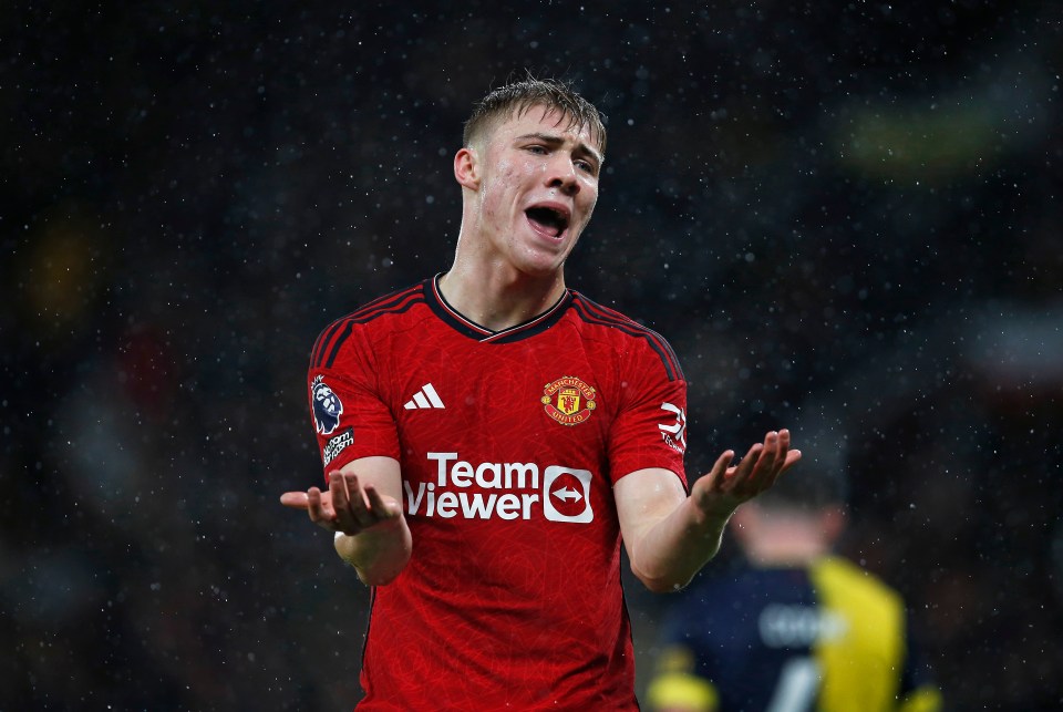 a soccer player wearing a red shirt that says team viewer