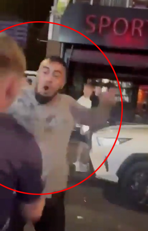 The moment a Benidorm driver swung a punch at an England fan after his car was slapped by boozy Brits