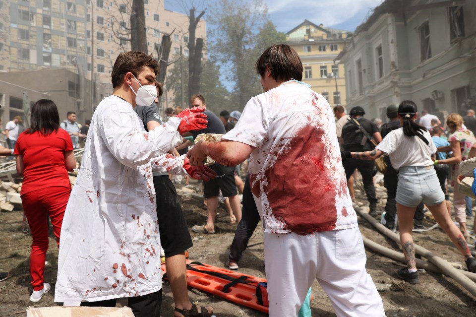 Rescuers, medical staff and volunteers were seen cleaning up the rubble and searching for victims after the Russian strike