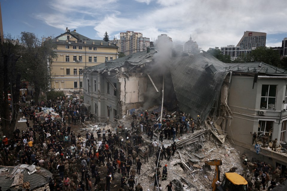 Thousands gathered outside the hospital as the building crumbled under Putin's blasts