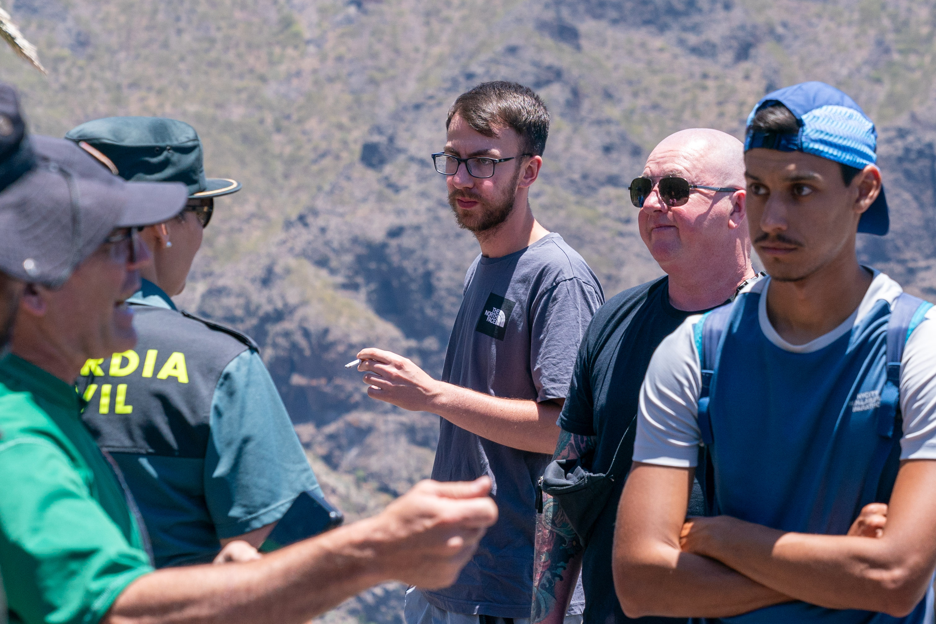 Jay's dad and brother speak to Tenerife police during the search