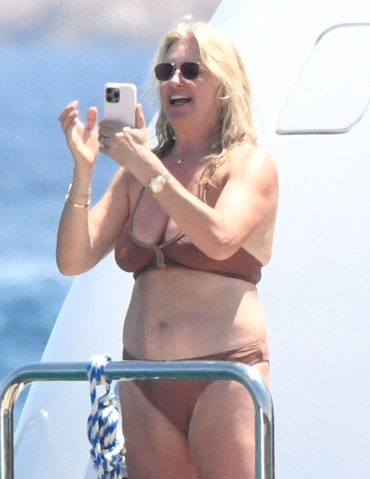 Penny Lancaster, 53, was snapped showcasing a string of itsy bitsy bikinis on holiday