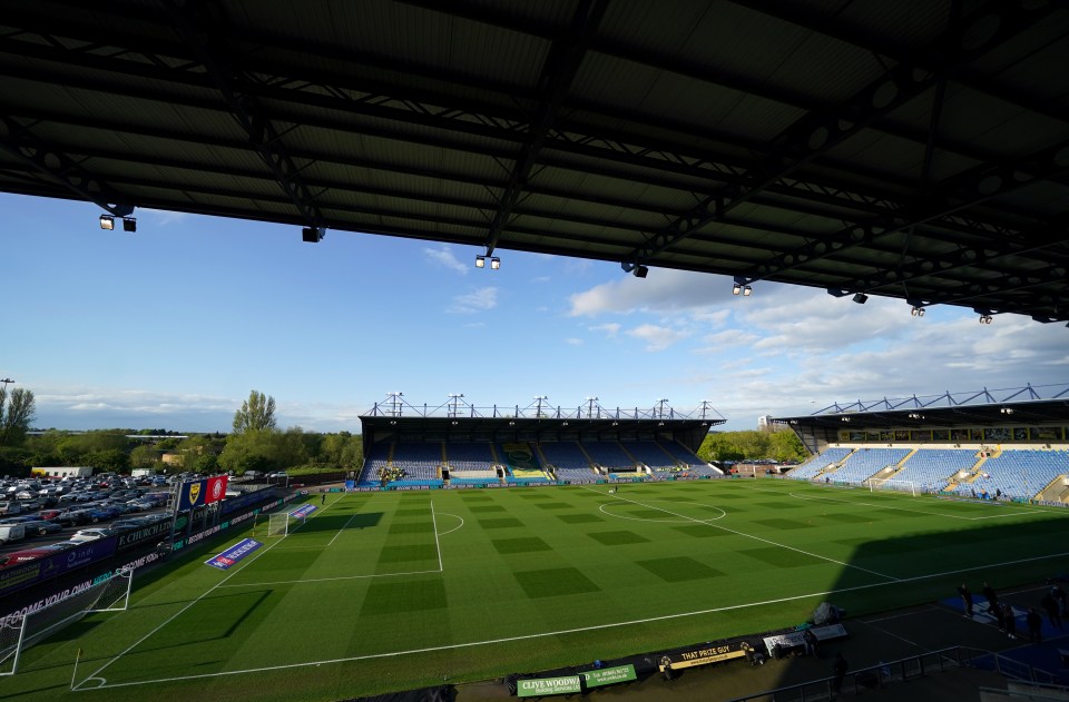 a soccer field with a sign that says ' allianz ' on it