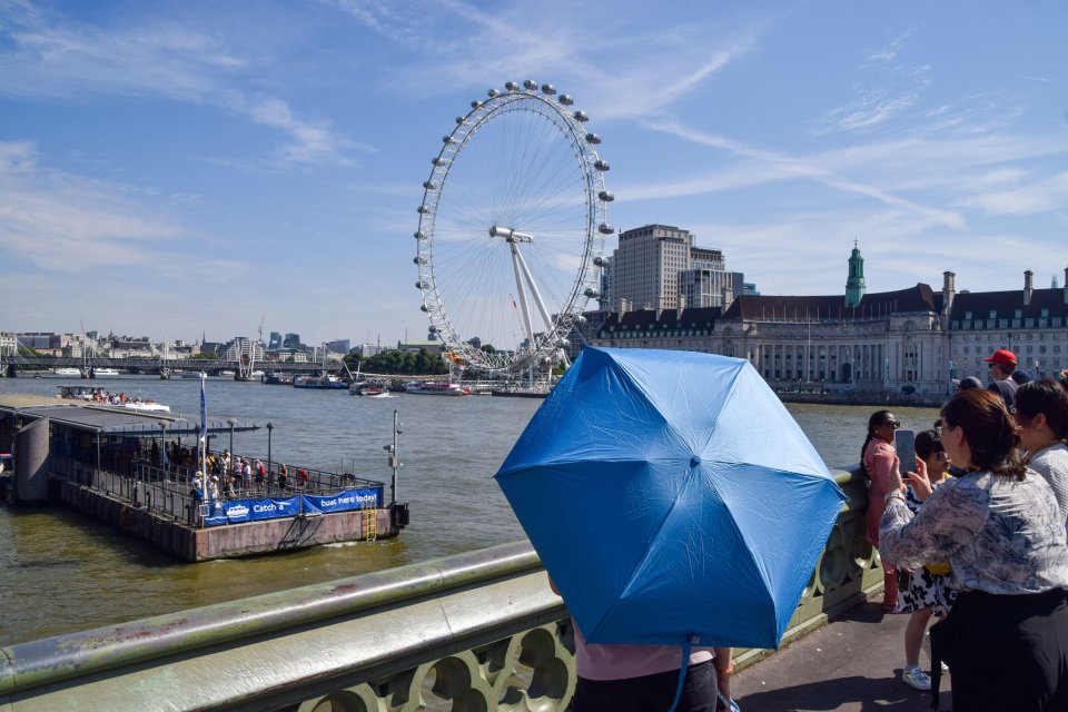 Londoners enjoying the city view yesterday as temperatures reached over 30C