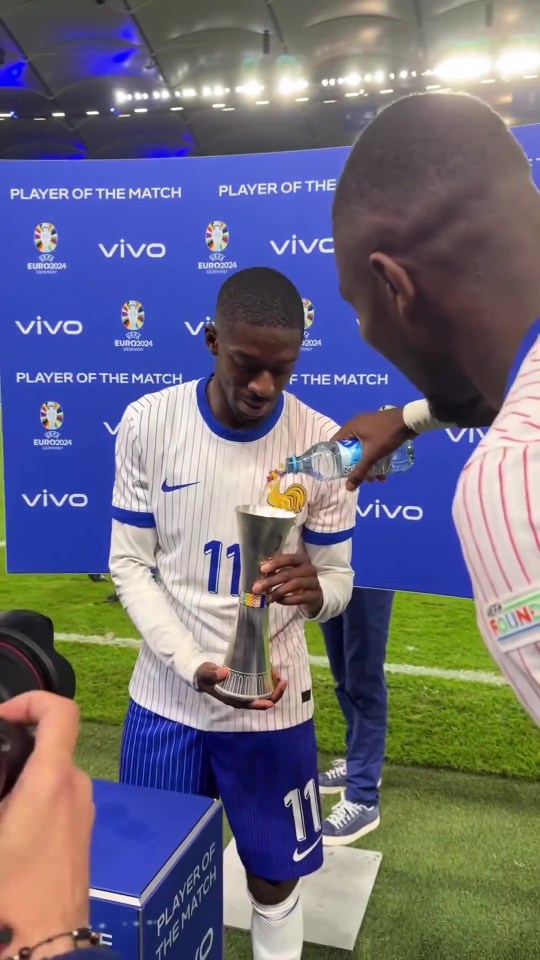 While Marcus Thuram filled his trophy with water