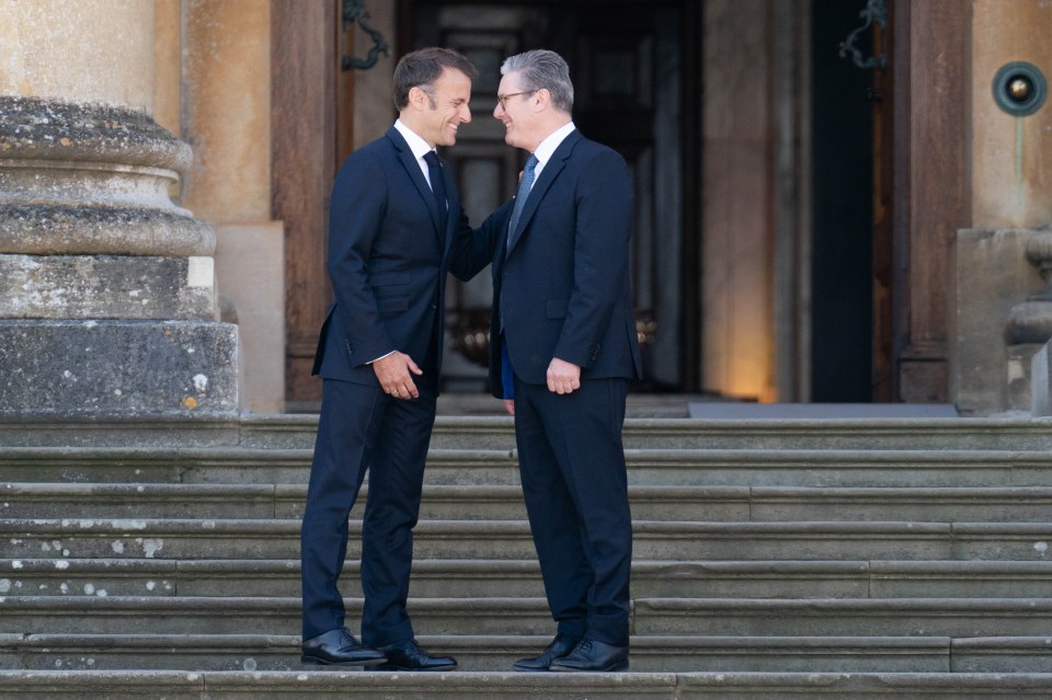 French President Emmanuel Macron is welcomed by Prime Minister Sir Keir Starmer to the European Political Community summit at Blenheim Palace