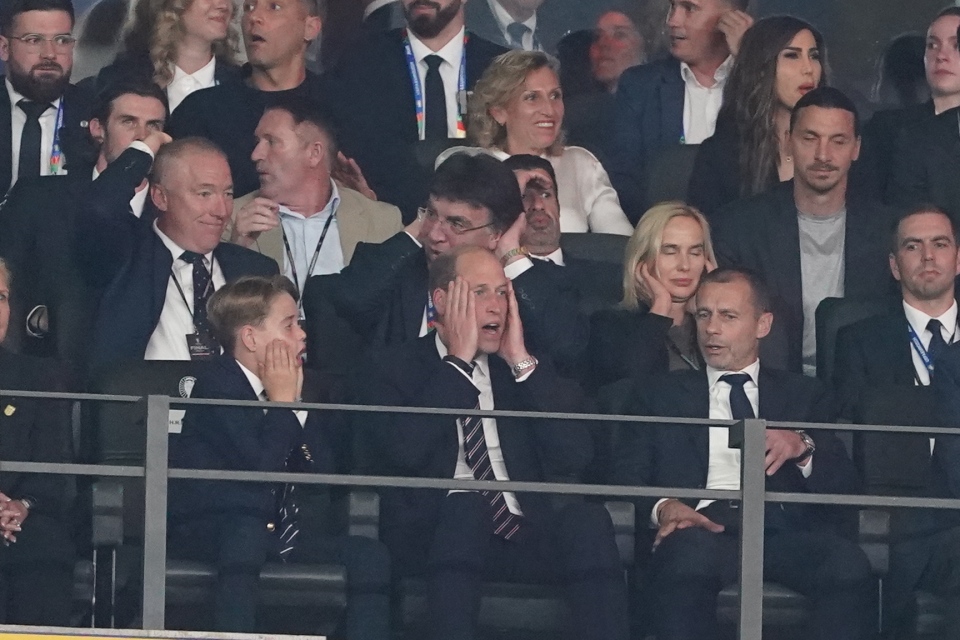 The pair looked devastated and in disbelief as England lost to Spain 2 - 1